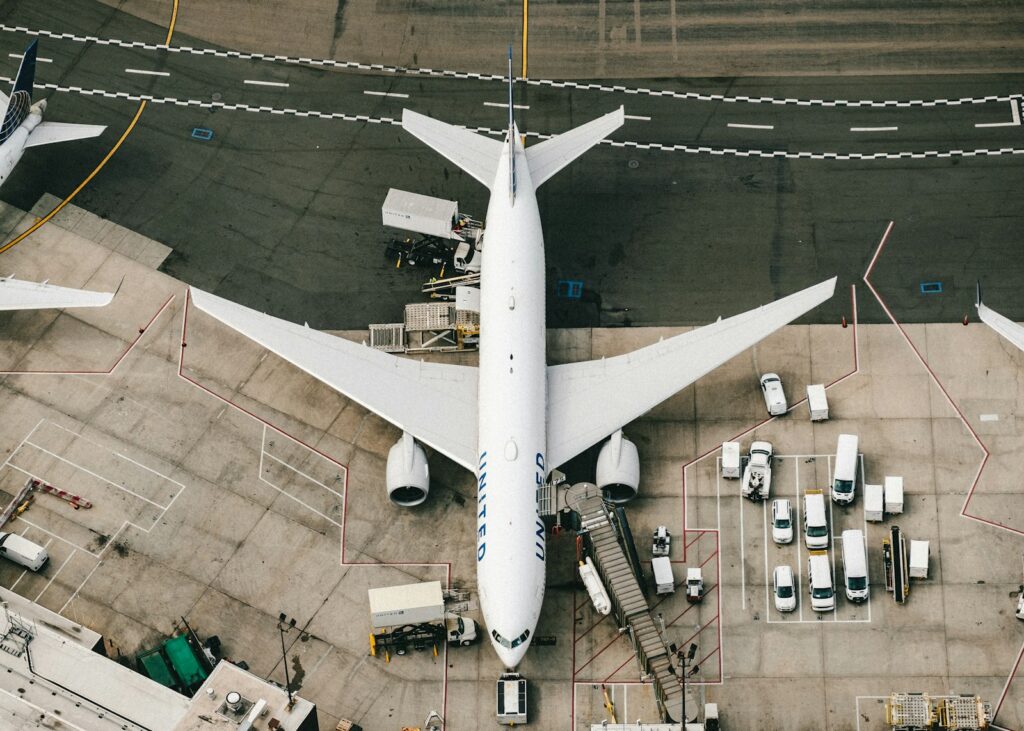 Airplane at an airport, illustrative air transport photograph by Chris Leipelt