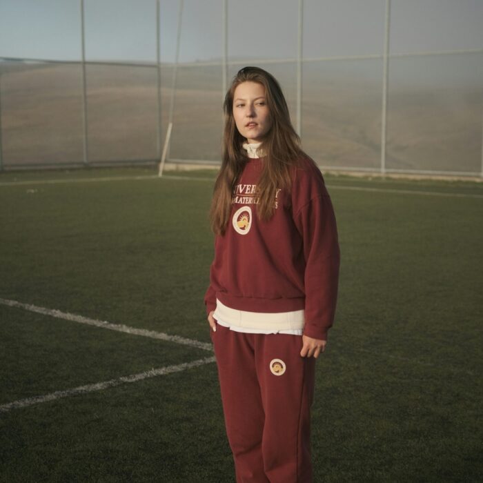 Illustrative tracksuit styling reference, credited to Anton Luk